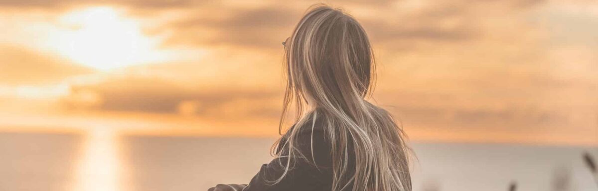 Girl, sunset, title of article at top - square image